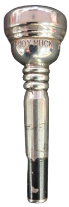 Silver trumpet mouthpiece with 'Rudy Muck' branding on a white background