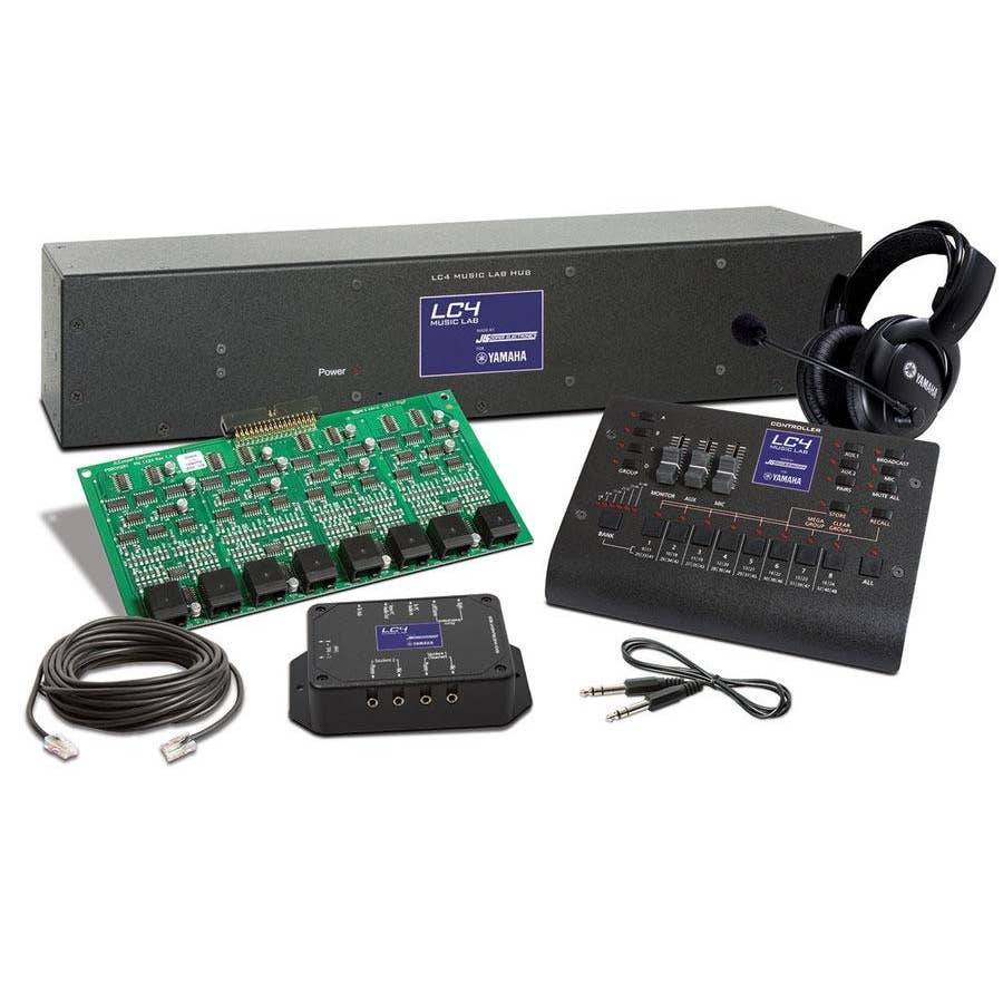 Yamaha LC4 Live Performance System kit  including a large black power box, green circuit board, black control panel, headphones, patch cables, and a small black signal processor.