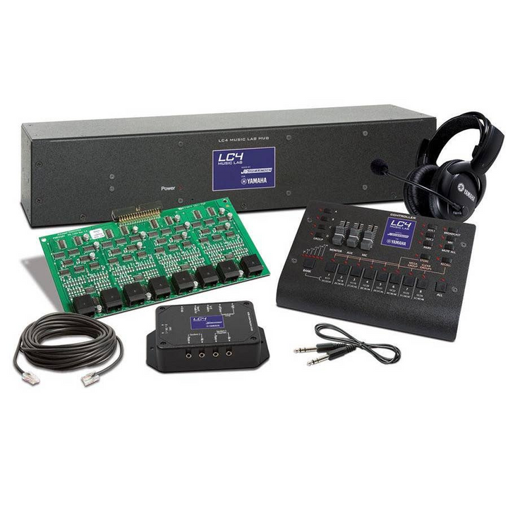 Yamaha LC4 Live Performance System kit  including a large black power box, green circuit board, black control panel, headphones, patch cables, and a small black signal processor.