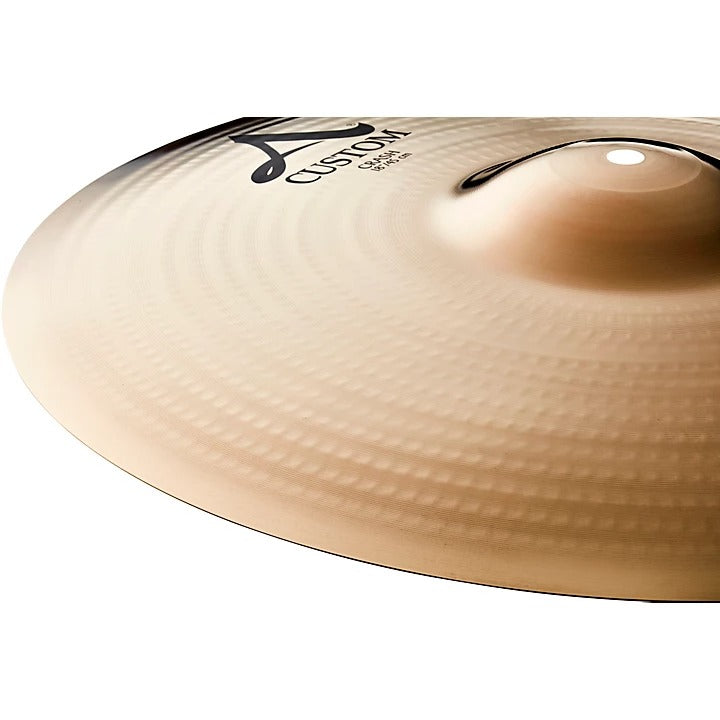 Close-up of a cymbal with 'Zildjian' branding on a white background